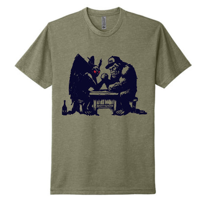 Mothman vs. Squatchy Olive Tee